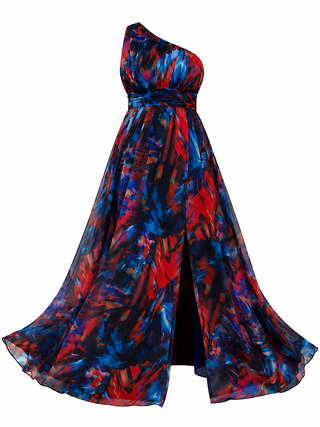 A one-shoulder maxi dress with a flowing A-line skirt, featuring an abstract painterly pattern in vibrant red, royal blue, and black, set against a plain white background.