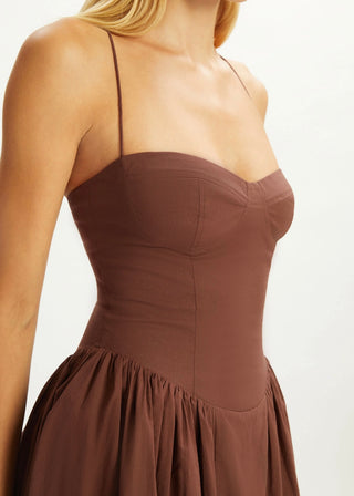 Brown dress with thin straps on a white background