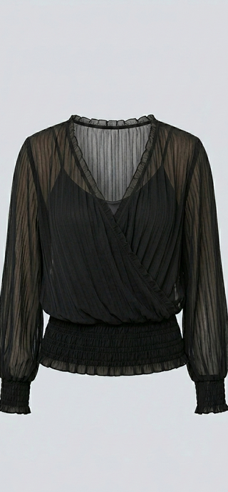 Black sheer blouse with long sleeves on a light gray background