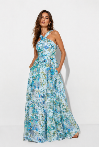 Woman wearing a floral dress on a white background
