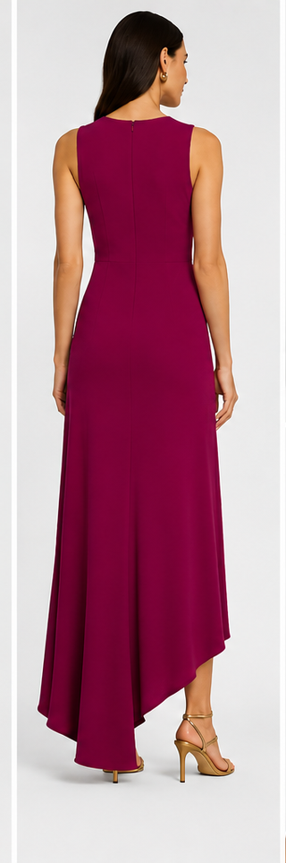 Woman wearing a burgundy evening gown on a white background