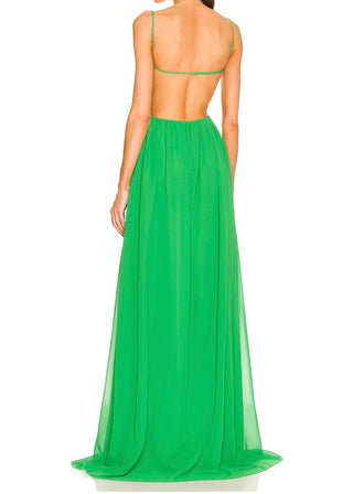 Green evening gown with open back on a white background