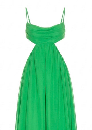 Green evening gown with thin straps on a white background