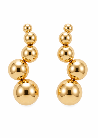 Pair of gold ball earrings on a white background