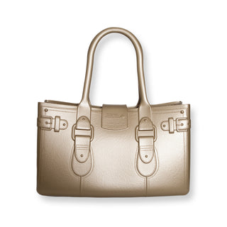 Gold handbag with a strap on a white background