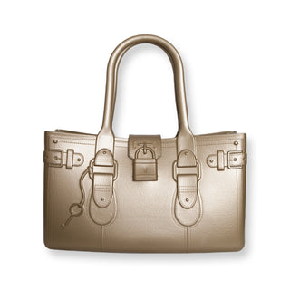 Gold handbag with a strap on a white background
