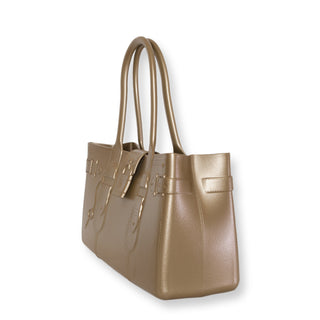 Gold handbag on a white background