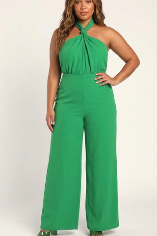 Woman wearing a green jumpsuit on a white background