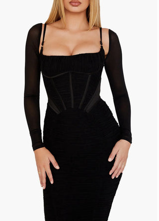 Black dress with sheer sleeves on a white background
