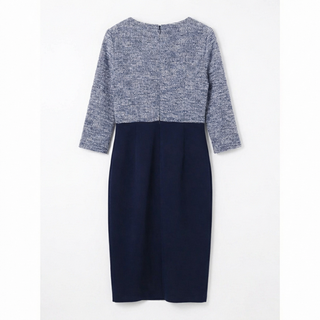 Two-tone dress with gray top and navy skirt on a white background