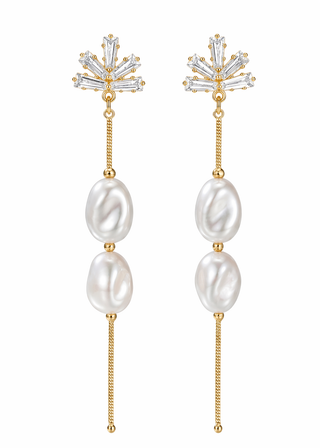 Pair of pearl earrings with gold accents on a white background