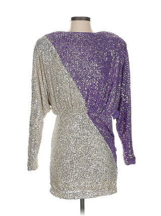 Two-tone silver and purple dress on a mannequin against a white background
