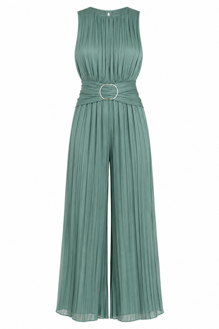 A sleeveless, wide-leg jumpsuit in sage green with a pleated texture, featuring a gathered waist and a single circular gold-tone belt buckle, shown against a plain white background.