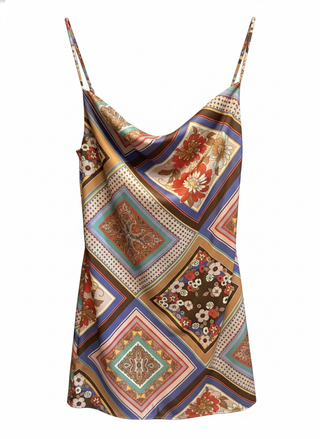 Multicolored patterned slip dress on a white background